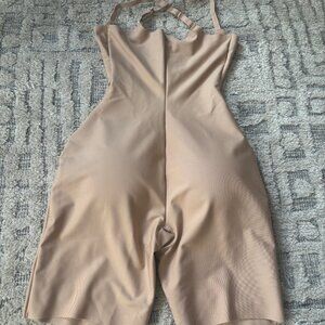 SKIMS Body Butt Enhancing Open Bust Padded Bodysuit, Size M in Color Sand